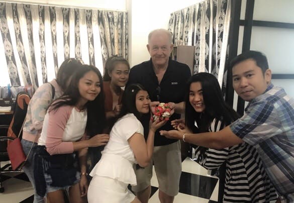 thai888 law office staff with the boss as it was his birthday 2018